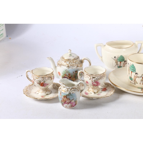 7 - Part nursery teaset, and a Royal Doulton figurine, Melanie.