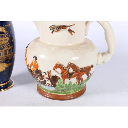 143 - 19th century Pearson's jug depicting a hunting scene, 15cm high, along with a Carltonware vase.