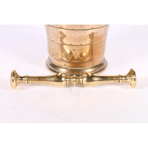 145 - Brass mortar and pestle, 11cm high.