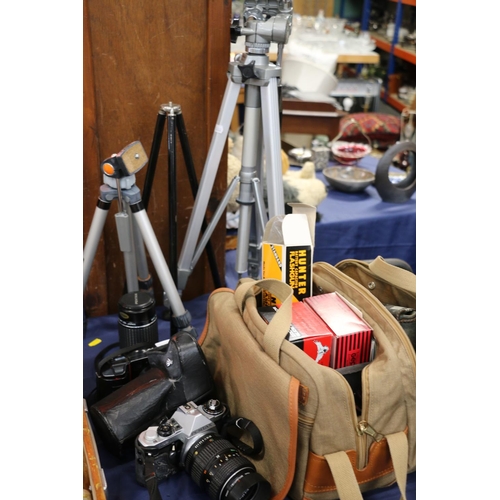 87 - Camera equipment to include a Pentax camera, lenses, tripods, etc.