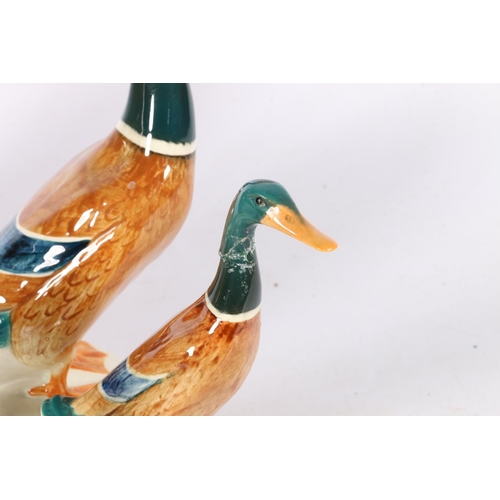 96 - Beswick model of a duck #902, and four smaller.