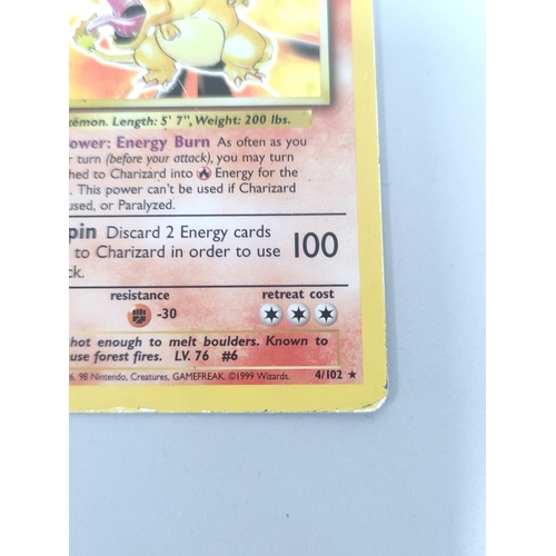 31 - Pokemon Trading Card Game. Charizard holo card no 4/102 (unlimited) Wizards 1999.