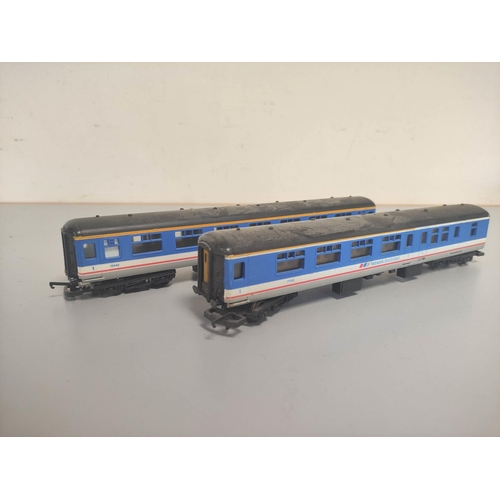 162 - Box of 00 gauge model trains and rolling stock to include Hornby and Triang comprising of two Hornby... 