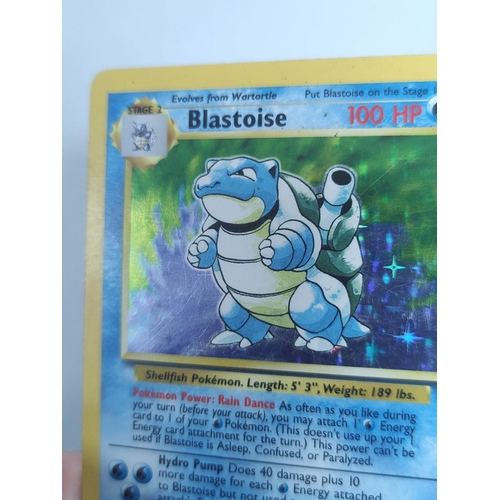 32 - Pokemon Trading Card Game. Blastoise holo card no 2/102 (unlimited) Wizards 1999.