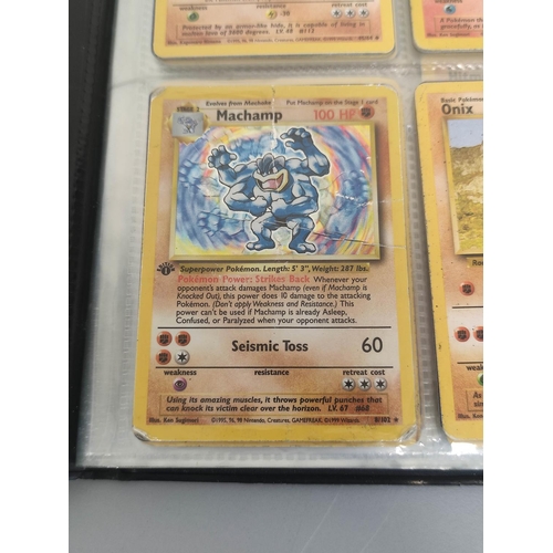 32A - Pokemon Trading Card Game. Folder of cards to include Machamp holo (unlimited) 8/102, Ninetales holo... 