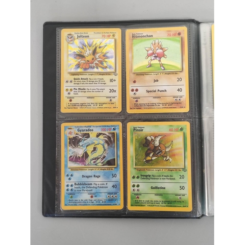 32B - Pokemon Trading Card Game. Folder of cards comprising of base, fossil and jungle sets. also to inclu... 