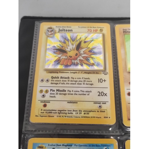 32B - Pokemon Trading Card Game. Folder of cards comprising of base, fossil and jungle sets. also to inclu... 