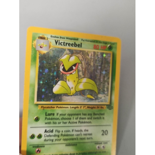 32B - Pokemon Trading Card Game. Folder of cards comprising of base, fossil and jungle sets. also to inclu... 