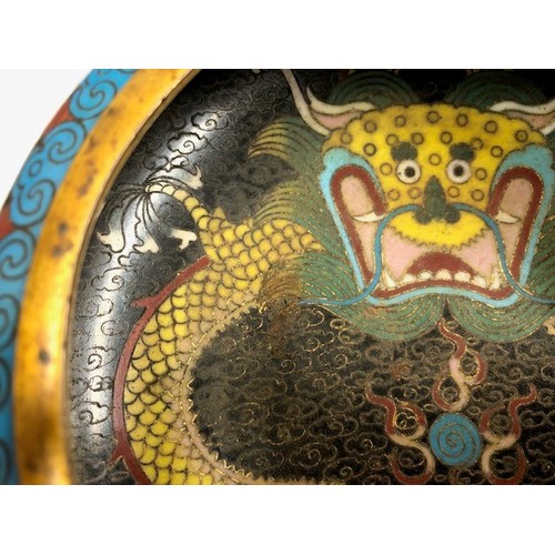 11 - Chinese cloisonné bowl, five claw dragons to sides and well with wooden stand, 14cm diameter.