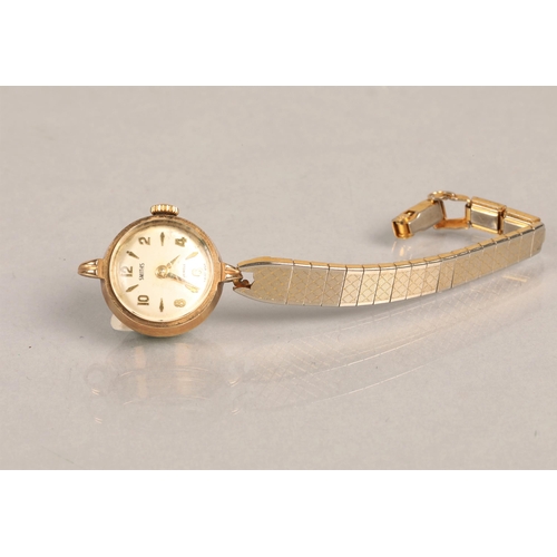 123 - 9ct gold Smiths watch, with partial metal strap.