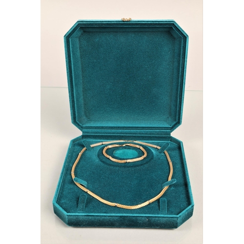 84 - 18ct gold necklace, with matching bracelet, in fitted case, 27.3g.