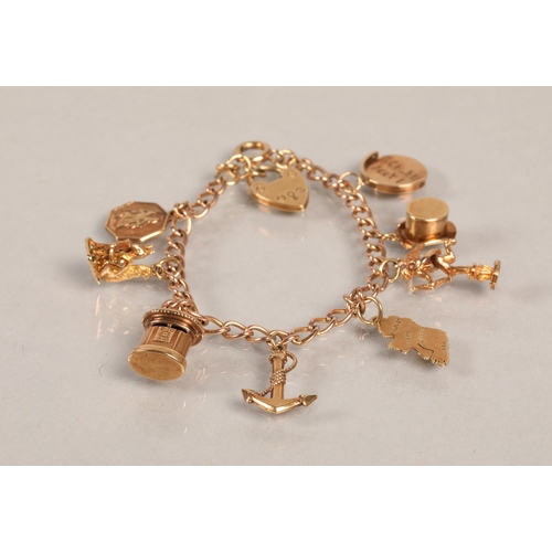 87 - 9ct gold charm bracelet, 16g.