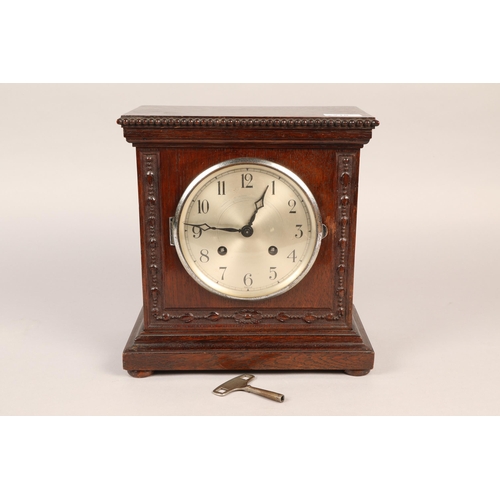 218 - Mahogany mantel clock.