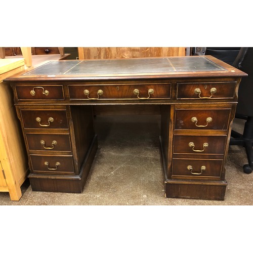 542 - Mahogany pedestal desk, with tooled green leather skiver.