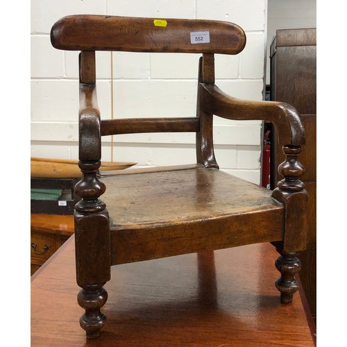 552 - Victorian mahogany child's open armchair 47cm high.