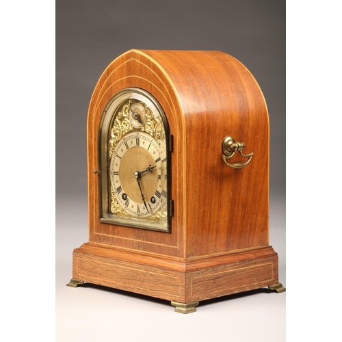 226 - Edwardian inlaid mahogany lancet top striking mantle clock, gilt scrollwork dial with silvered chapt... 