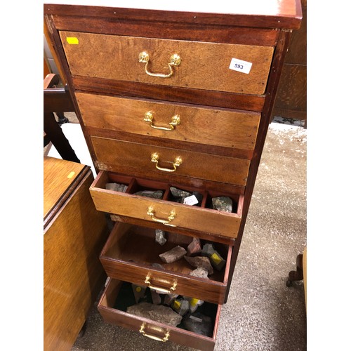 593 - Seven drawer tallboy containing rocks, fossils, Peruvian ceramics, etc. 120cm high.... 