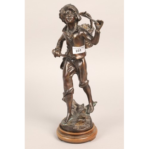 231 - Bronzed figure of a peasant boy.