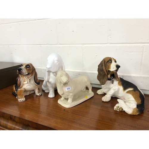 574 - Four basset hound models.  (4)