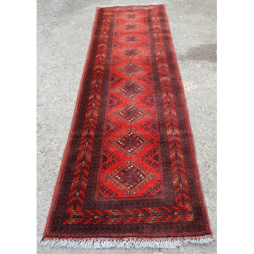 351 - Afghan Khal Mohammadi runner with nine central geometric lozenges and further all over geometric mot... 