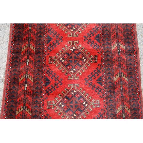 351 - Afghan Khal Mohammadi runner with nine central geometric lozenges and further all over geometric mot... 