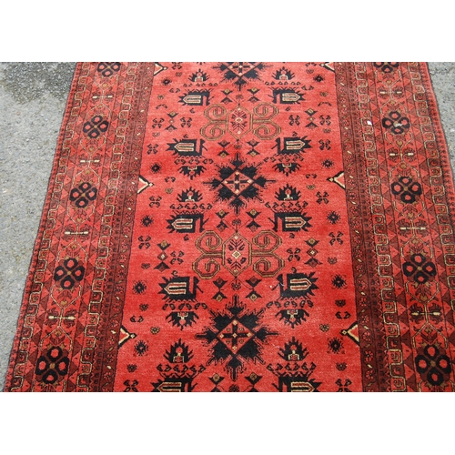 352 - Afghan Khal Mohammadi rug with all over floral and geometric lozenges on blue, cream and red ground,... 