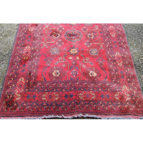 354 - Afghan Khal Mohammadi rug with all over floral and geometric decoration on blue, beige and red groun... 