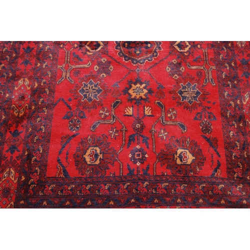 354 - Afghan Khal Mohammadi rug with all over floral and geometric decoration on blue, beige and red groun... 