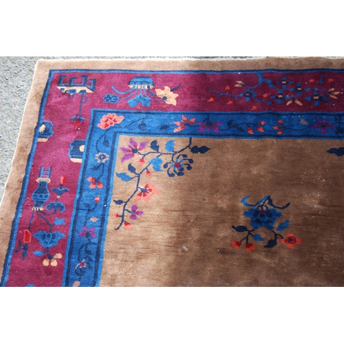 355 - Chinese rug, c. early 20th century, with all over floral panels on beige ground with a blue, wine an... 