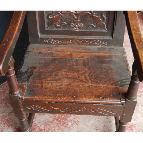 365 - Oak Wainscot chair, c. late 17th/early 18th century, decorated with fleur de lys motifs and a floral... 