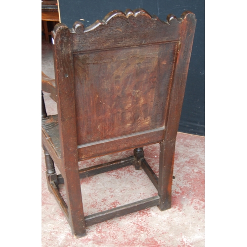 365 - Oak Wainscot chair, c. late 17th/early 18th century, decorated with fleur de lys motifs and a floral... 