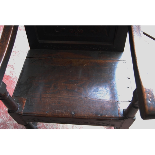 365 - Oak Wainscot chair, c. late 17th/early 18th century, decorated with fleur de lys motifs and a floral... 