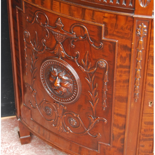 366 - Mahogany commode of demi-lune shape in the 18th century style, with a drawer above a cupboard door e... 