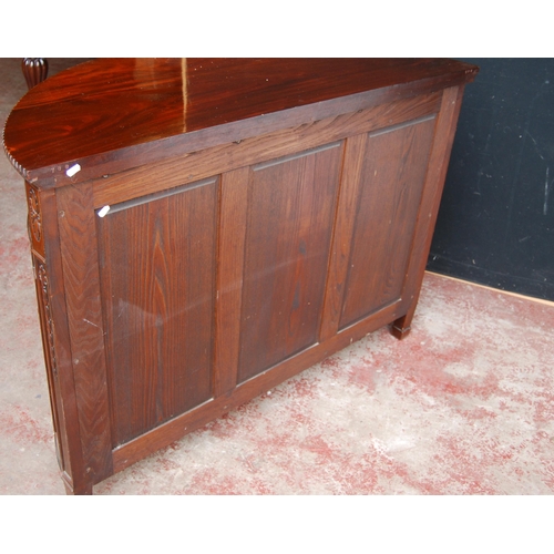 366 - Mahogany commode of demi-lune shape in the 18th century style, with a drawer above a cupboard door e... 