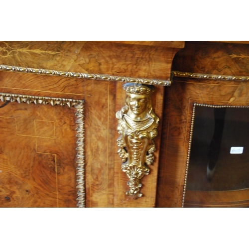 379 - Late Victorian inlaid walnut credenza with a central inlaid door flanked bowfront glazed doors enclo... 