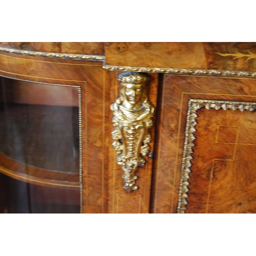 379 - Late Victorian inlaid walnut credenza with a central inlaid door flanked bowfront glazed doors enclo... 