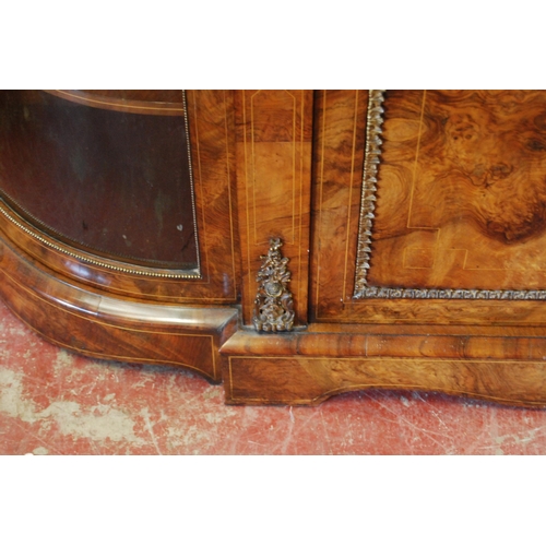 379 - Late Victorian inlaid walnut credenza with a central inlaid door flanked bowfront glazed doors enclo... 