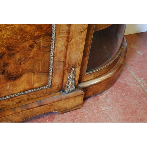 379 - Late Victorian inlaid walnut credenza with a central inlaid door flanked bowfront glazed doors enclo... 