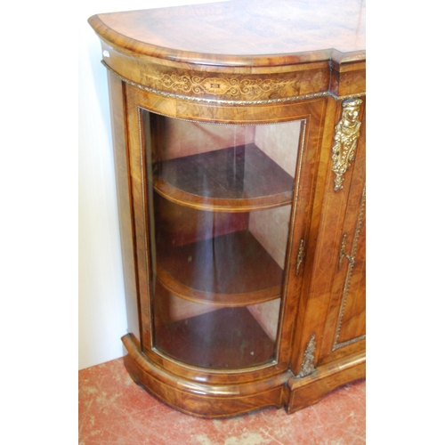 379 - Late Victorian inlaid walnut credenza with a central inlaid door flanked bowfront glazed doors enclo... 