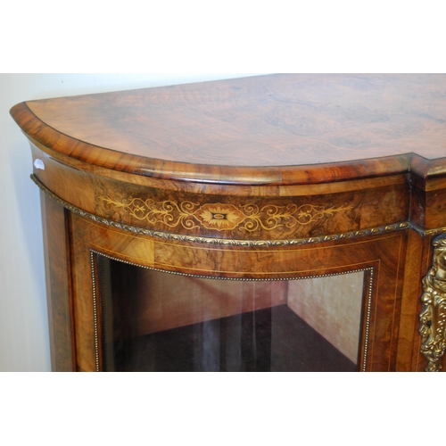 379 - Late Victorian inlaid walnut credenza with a central inlaid door flanked bowfront glazed doors enclo... 