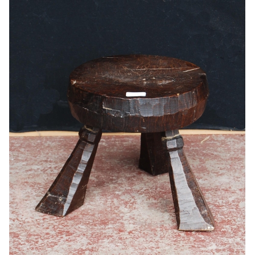 381 - Jack Grimble of CromerOak and elm stool, the circular top on feline tripod supports, inscribed JG to... 