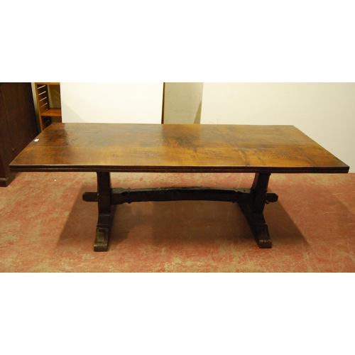 385 - Jack Grimble of CromerOak and elm refectory table with large plank top, on twin trestle supports uni... 