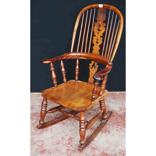 387 - Antique yew wood and elm Windsor rocking chair with hoop frame, stick back with pierced splat, pad a... 