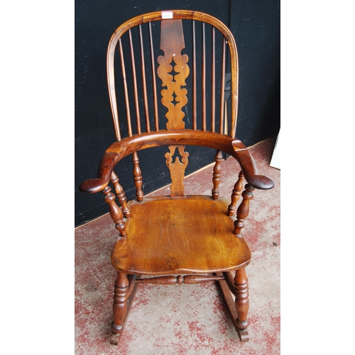 387 - Antique yew wood and elm Windsor rocking chair with hoop frame, stick back with pierced splat, pad a... 