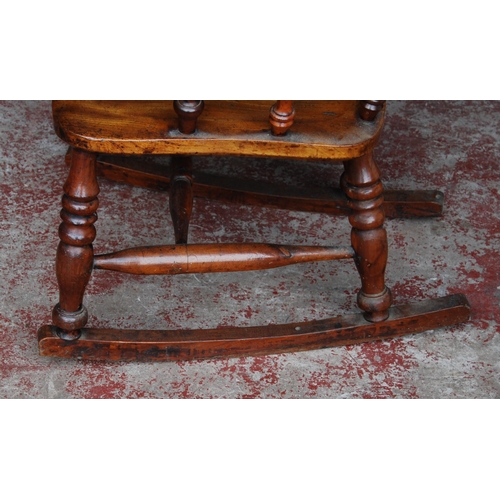 387 - Antique yew wood and elm Windsor rocking chair with hoop frame, stick back with pierced splat, pad a... 