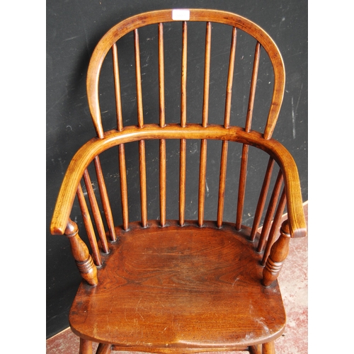 388 - Antique ash and elm Windsor armchair with hoop frame, stick back and solid seat, on turned supports ... 