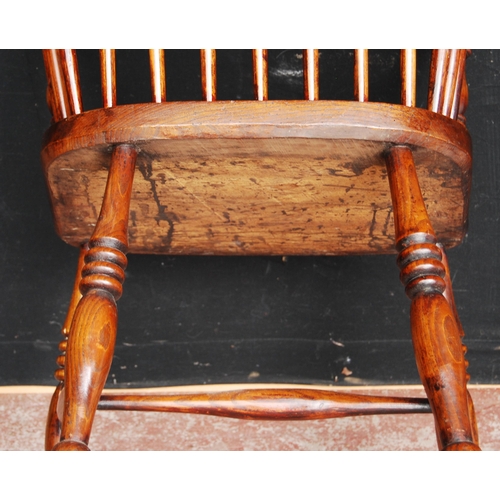 388 - Antique ash and elm Windsor armchair with hoop frame, stick back and solid seat, on turned supports ... 