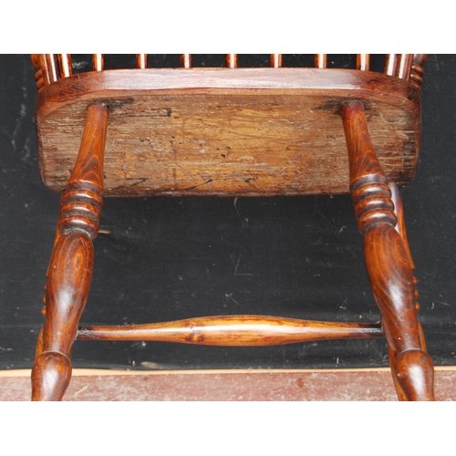 389 - Antique ash and elm Windsor armchair with hoop frame, stick back and solid seat, on turned supports ... 