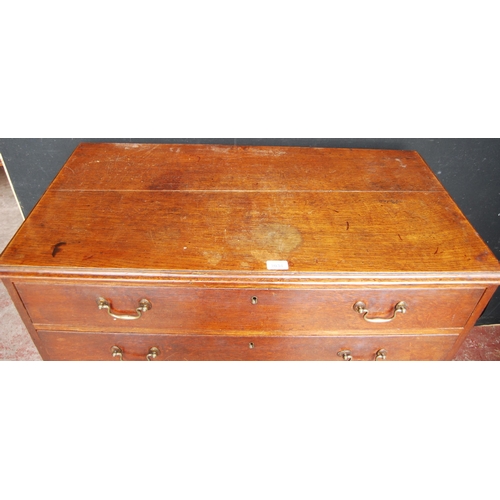 393 - George III oak chest of four graduated long drawers, on bracket feet, 93cm high, 97.5cm wide and 49c... 