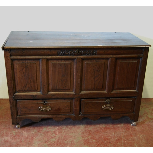 394 - George II period oak and elm coffer with hinged top, inscribed to the frieze 'WCM 1731', above panel... 